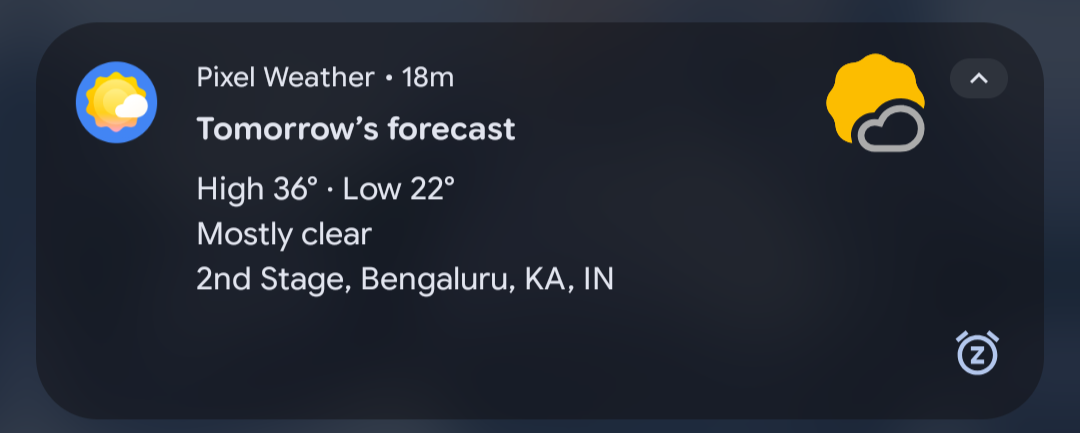 A Google weather notification informing me that tomorrow's expected temperature range is 22°C to 36°C with pretty much zero cloud cover.